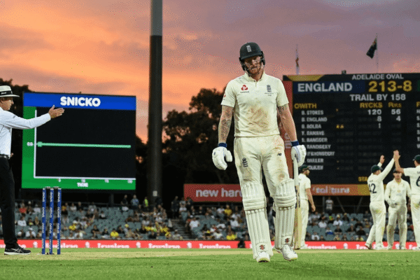 England batters walk off at Adelaide Oval after another collapse in the Ashes, with Australian fielders celebrating in extreme heat.
